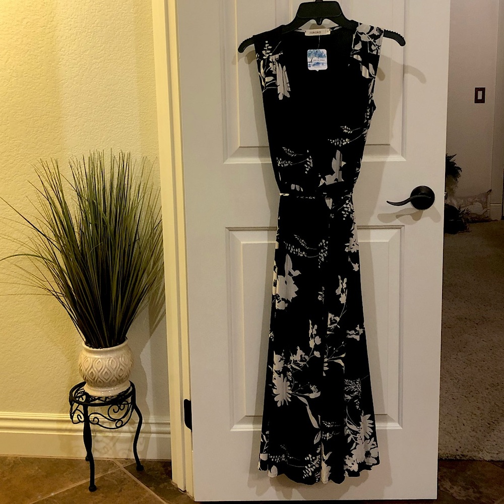 Black and white floral mid calf length, sleeveless dress. Tags still on